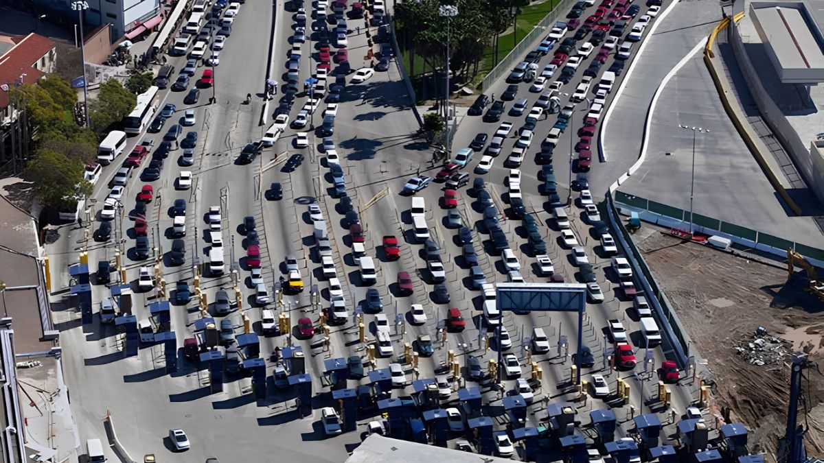 Aerial view of cars lined up in multiple lanes at the San Ysidro border checkpoint
