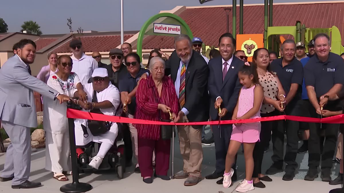 A diverse group of community members and local leaders gathered for a ribbon-cutting ceremony in San Ysidro, highlighting community connections and resources