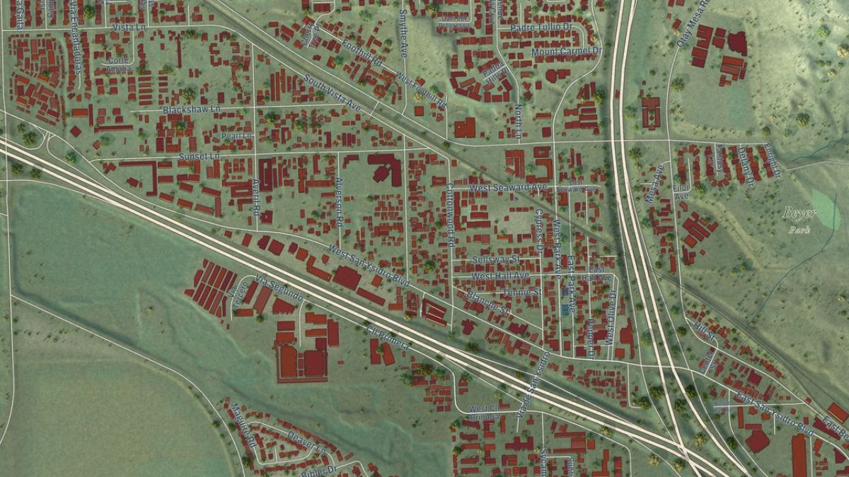 Overhead aerial map showing street layouts, buildings, and commercial corridors across San Ysidro