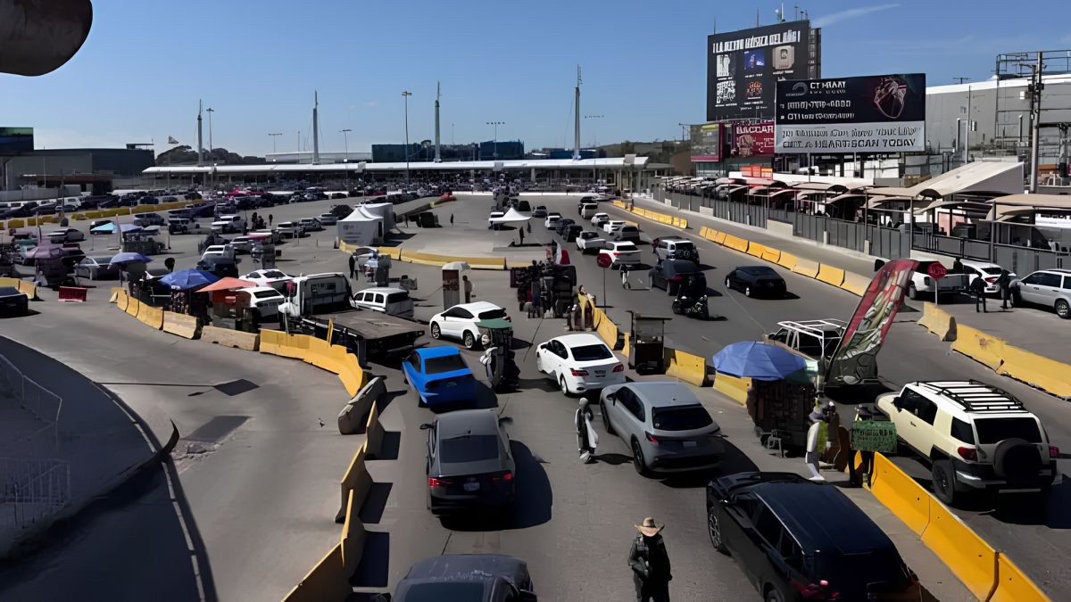 Cars lined up in heavy traffic and security lanes approaching the San Ysidro border crossing