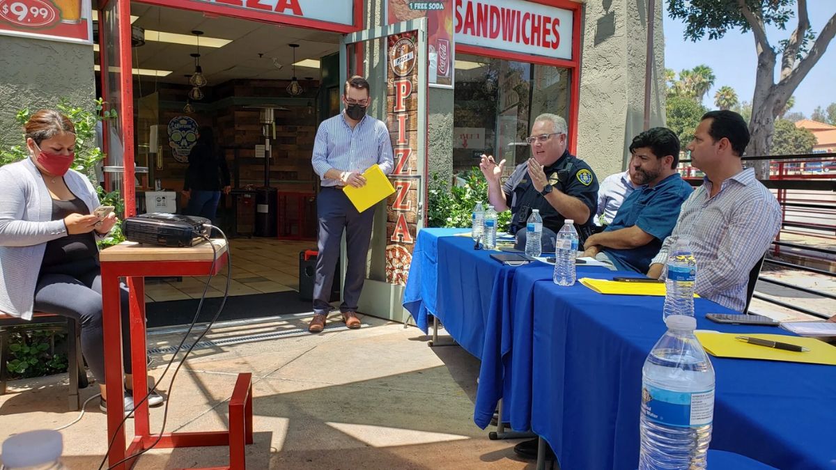San Ysidro small-business owners and community stakeholders gathered outside a local storefront for a panel discussion with city officials and law enforcement.